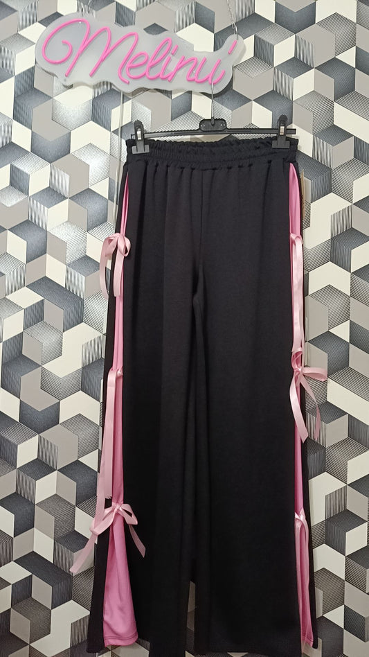 Pantaloni con fiocchi